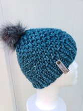 Load image into Gallery viewer, Knobby beanie in teal topped with a faux fur pom.