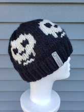 Load image into Gallery viewer, Classic black beanie with skull design in ivory. No pom.