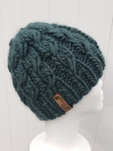 Load image into Gallery viewer, Cable effect beanie in a dark green color. No pom.