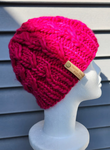 Bright pink braided effect beanie. No pom.