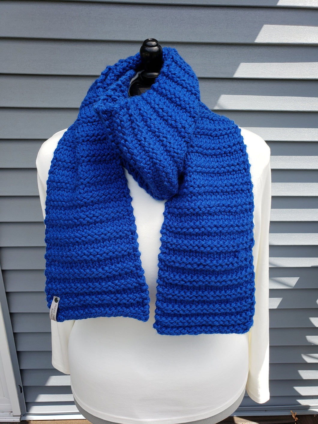 Bright blue standard winter scarf.