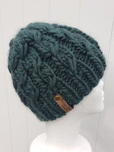 Load image into Gallery viewer, Cable effect beanie in a dark green color. No pom.
