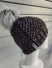 Load image into Gallery viewer, Textured beanie in multicolor green, blue, greys. Topped with a large grey faux fur pom.
