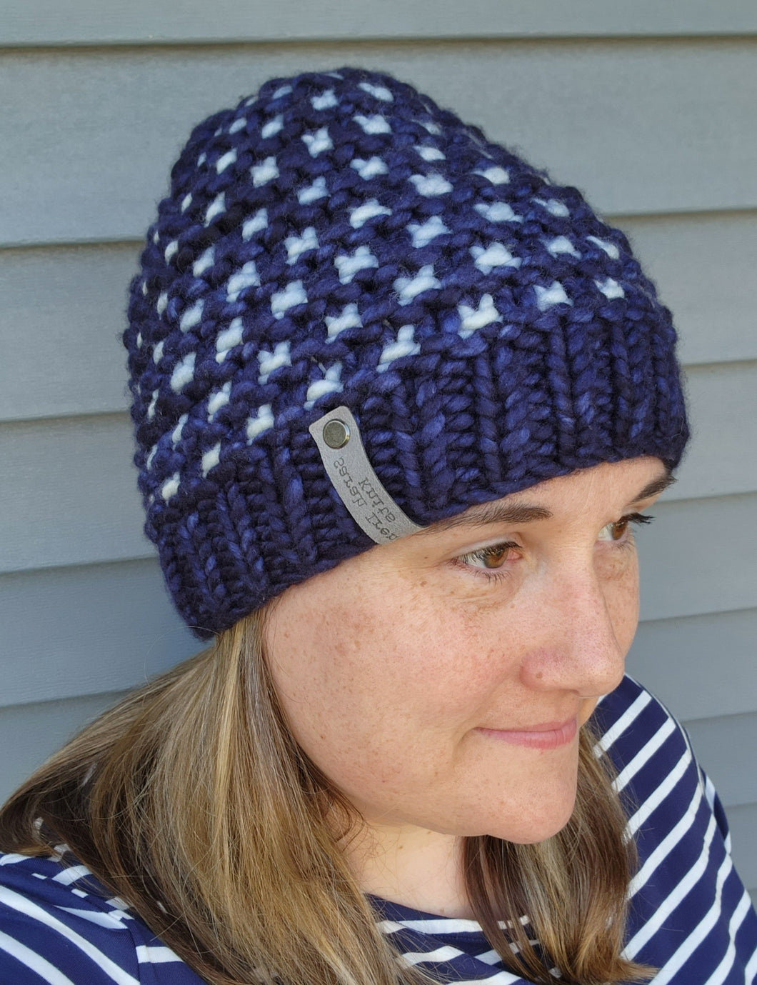 Windowpane effect beanie in navy and light blue. No pom.