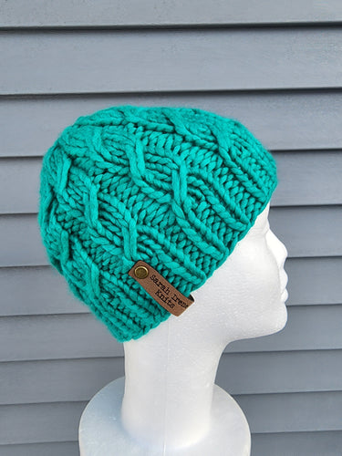 Braided effect beanie in teal green color No pom.